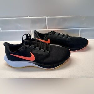 Nike Men's size 10 Black and Orange Running Shoes. Never worn!